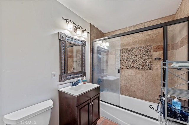 9075 Mesa Vista St, Apple Valley, CA 92308 - bathroom with toilet, vanity, and bath / shower combo with glass door