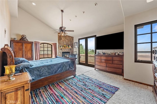 9075 Mesa Vista St, Apple Valley, CA 92308 - carpeted bedroom with access to outside, baseboards, a fireplace, high vaulted ceiling, and a ceiling fan