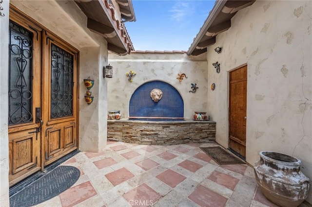9075 Mesa Vista St, Apple Valley, CA 92308 - doorway to property featuring stucco siding
