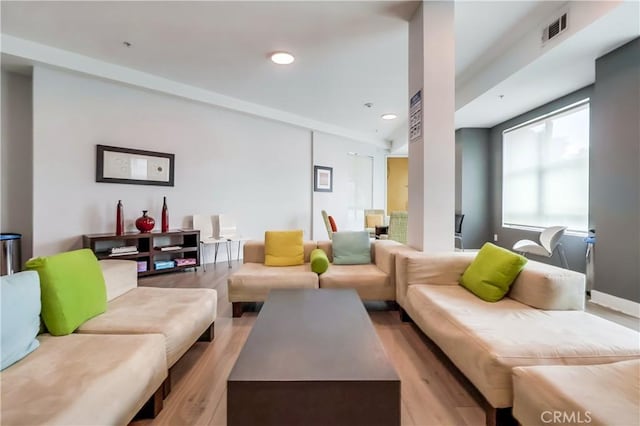 395 E 4th St Unit 13, Long Beach, CA 90802 - living area featuring light wood finished floors and recessed lighting