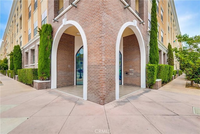 395 E 4th St Unit 13, Long Beach, CA 90802 - doorway to property with brick siding