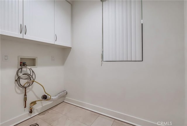 395 E 4th St Unit 13, Long Beach, CA 90802 - laundry area featuring cabinet space, baseboards, washer hookup, and hookup for a gas dryer