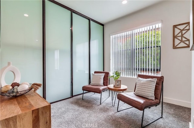 395 E 4th St Unit 13, Long Beach, CA 90802 - living area featuring carpet floors and baseboards