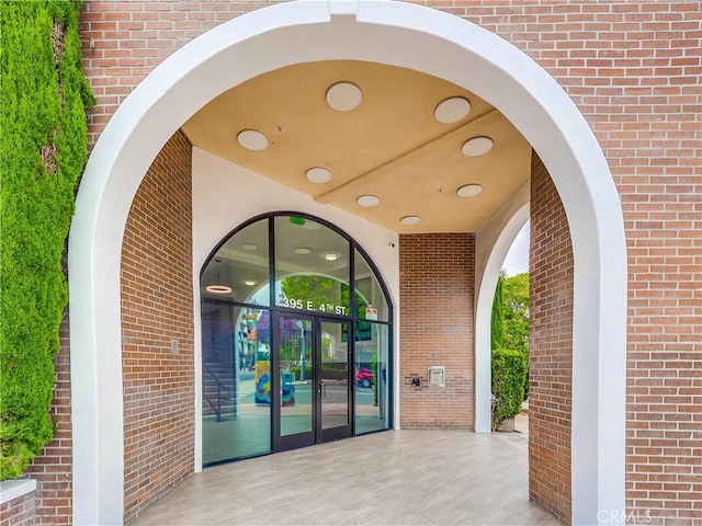 395 E 4th St Unit 13, Long Beach, CA 90802 - doorway to property with brick siding