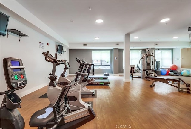 395 E 4th St Unit 13, Long Beach, CA 90802 - workout area with recessed lighting, wood finished floors, and baseboards