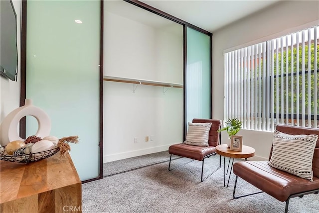 395 E 4th St Unit 13, Long Beach, CA 90802 - sitting room with carpet floors and plenty of natural light