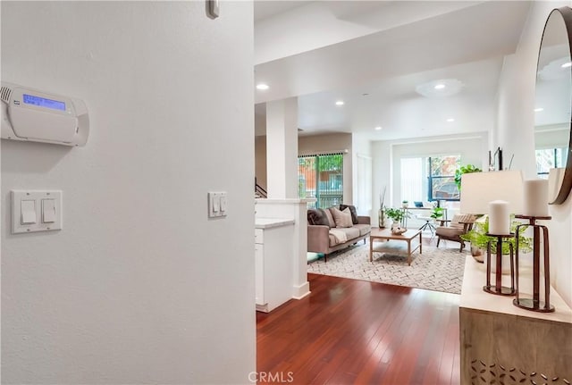 395 E 4th St Unit 13, Long Beach, CA 90802 - living area featuring dark wood-style flooring and recessed lighting