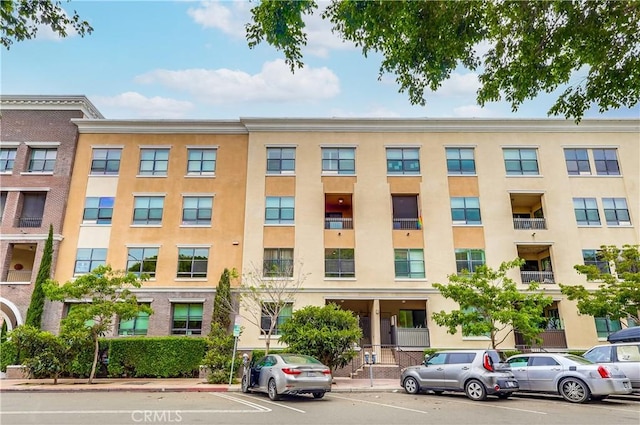 395 E 4th St Unit 13, Long Beach, CA 90802 - view of apartment building / complex with uncovered parking
