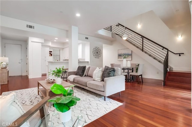 395 E 4th St Unit 13, Long Beach, CA 90802 - living room with wood finished floors, stairway, recessed lighting, and baseboards