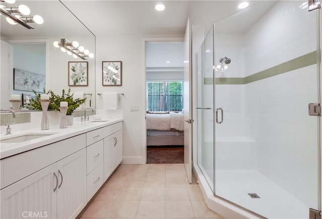 395 E 4th St Unit 13, Long Beach, CA 90802 - ensuite bathroom with double vanity, a stall shower, tile patterned flooring, recessed lighting, and a chandelier