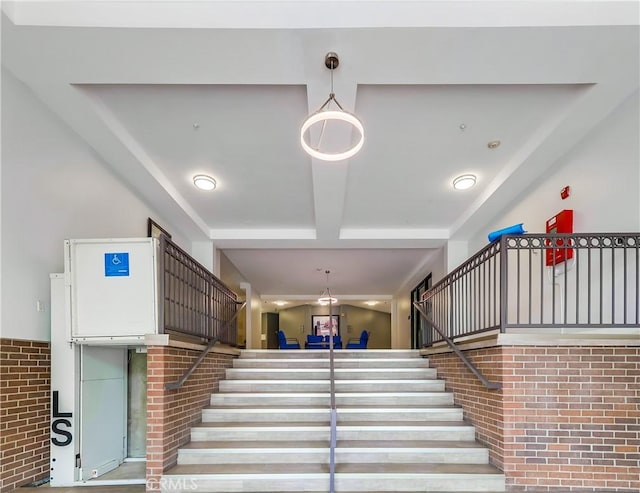 395 E 4th St Unit 13, Long Beach, CA 90802 - staircase featuring brick wall