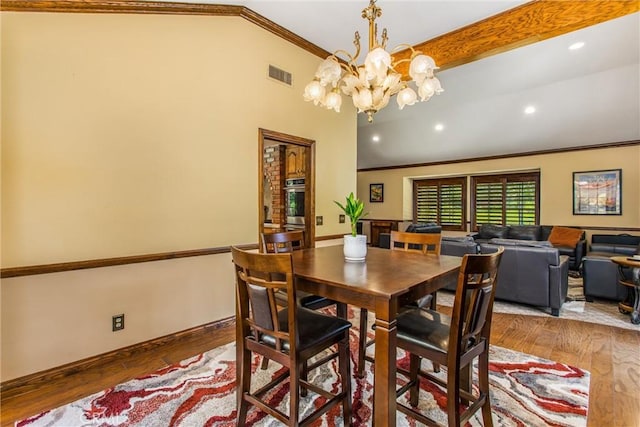 639 Valley View Dr, Redlands, CA 92373 - dining area with ornamental molding, a chandelier, wood finished floors, recessed lighting, and high vaulted ceiling