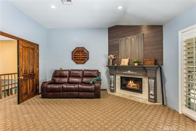 639 Valley View Dr, Redlands, CA 92373 - living area with carpet, vaulted ceiling, a fireplace, and recessed lighting