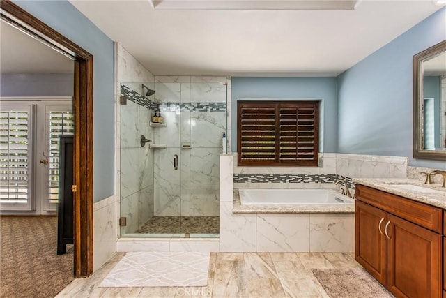 639 Valley View Dr, Redlands, CA 92373 - full bath with a bath, a marble finish shower, and vanity