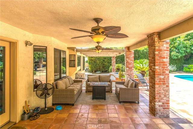 639 Valley View Dr, Redlands, CA 92373 - view of patio / terrace with outdoor lounge area, a ceiling fan, and an outdoor pool