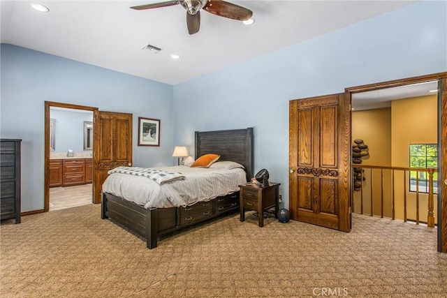 639 Valley View Dr, Redlands, CA 92373 - bedroom with light carpet, vaulted ceiling, recessed lighting, a ceiling fan, and ensuite bath