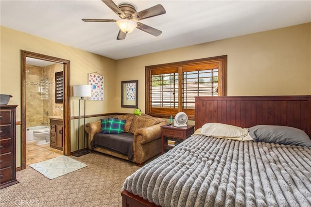 639 Valley View Dr, Redlands, CA 92373 - bedroom featuring ensuite bath, light colored carpet, and a ceiling fan