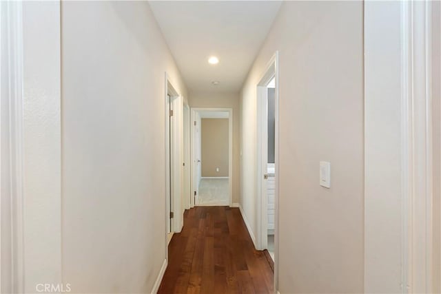 7000 Fabriano Pl, Rancho Cucamonga, CA 91701 - corridor featuring dark wood-style floors, baseboards, and recessed lighting