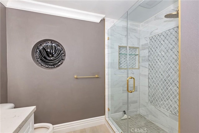 7000 Fabriano Pl, Rancho Cucamonga, CA 91701 - bathroom with toilet, a shower stall, vanity, and baseboards