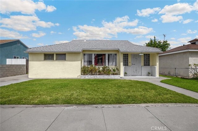 11705 Adonis Ave, Norwalk, CA 90650 - single story home featuring stucco siding and a porch
