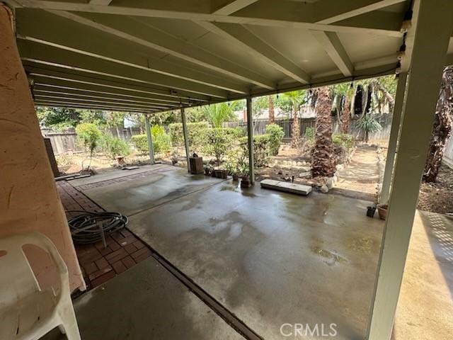 869 El Portal Dr, Merced, CA 95340 - fenced backyard with a patio area