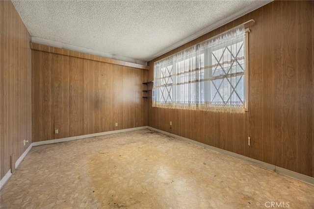 5426 Lakeview Ave, Yorba Linda, CA 92886 - unfurnished room with wood walls and a textured ceiling