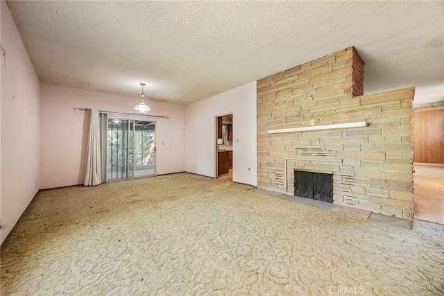 5426 Lakeview Ave, Yorba Linda, CA 92886 - unfurnished living room with carpet floors, a textured ceiling, and a fireplace