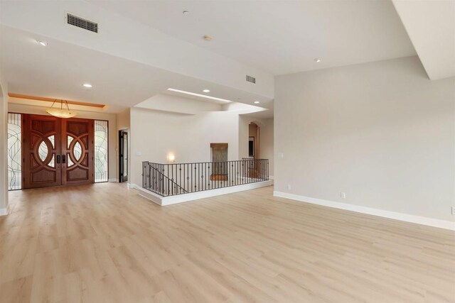 1320 Sleeping Indian Rd, Oceanside, CA 92057 - entryway with light wood-style flooring, baseboards, and recessed lighting