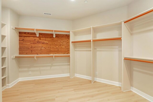 1320 Sleeping Indian Rd, Oceanside, CA 92057 - walk in closet featuring wood finished floors