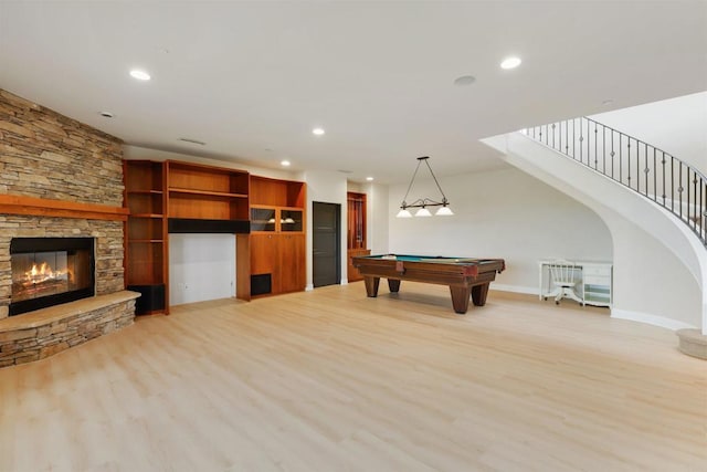 1320 Sleeping Indian Rd, Oceanside, CA 92057 - game room featuring recessed lighting, light wood finished floors, a stone fireplace, pool table, and baseboards
