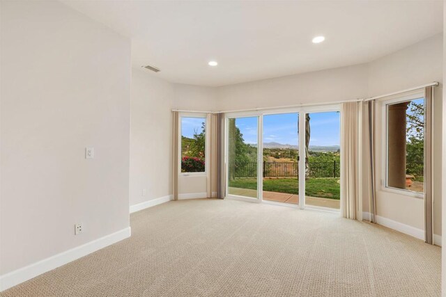 1320 Sleeping Indian Rd, Oceanside, CA 92057 - unfurnished room with light carpet, baseboards, and recessed lighting
