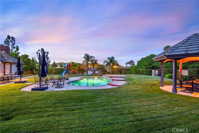 29302 Laro Dr, Agoura Hills, CA 91301 - view of pool with a gazebo, a patio, and a lawn