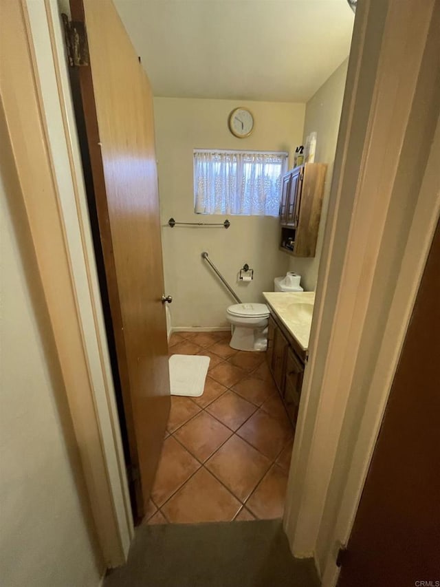 722 N Preston Dr E, Calexico, CA 92231 - bathroom featuring vanity, tile patterned flooring, and toilet