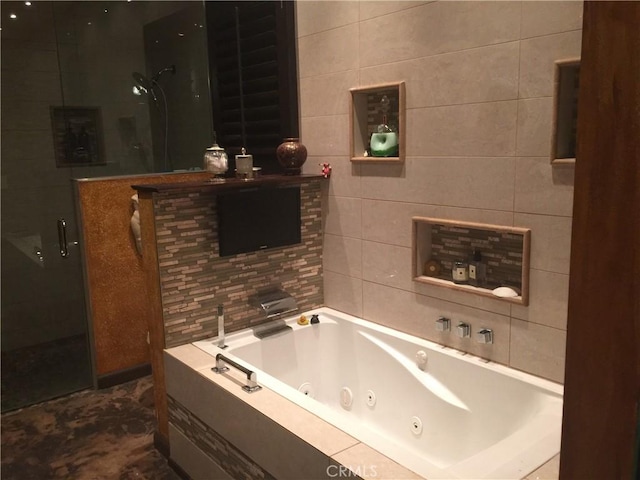 69598 Siena Ct, Cathedral City, CA 92234 - bathroom with a shower stall, a whirlpool tub, and tile walls