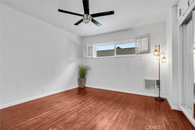 601 Olive Ave Unit L, Long Beach, CA 90802 - unfurnished room featuring wood finished floors, ceiling fan, and baseboards