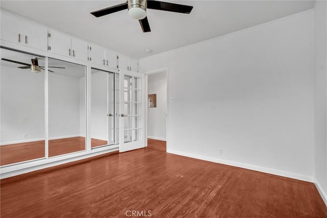 601 Olive Ave Unit L, Long Beach, CA 90802 - unfurnished room with a ceiling fan, french doors, wood finished floors, and baseboards