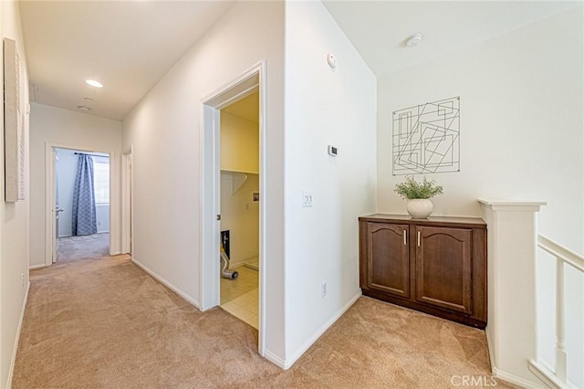 15405 Ashley Ct, Whittier, CA 90603 - corridor featuring light colored carpet and baseboards