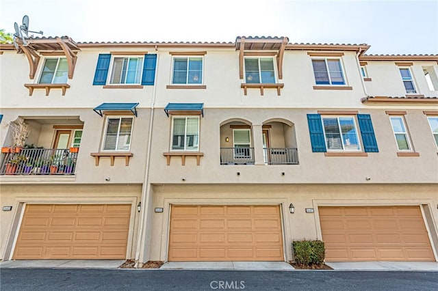 15405 Ashley Ct, Whittier, CA 90603 - view of property featuring stucco siding and a garage