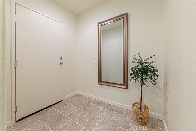 15405 Ashley Ct, Whittier, CA 90603 - foyer entrance with baseboards and light tile patterned floors
