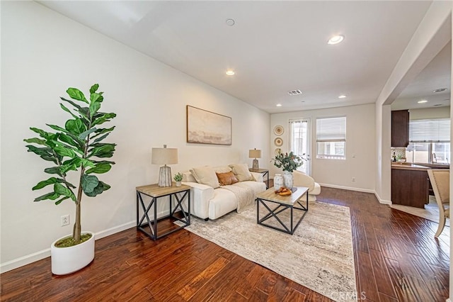 15405 Ashley Ct, Whittier, CA 90603 - living area with dark wood-type flooring, baseboards, and recessed lighting