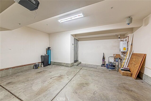 15405 Ashley Ct, Whittier, CA 90603 - garage with a garage door opener and water heater