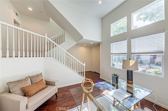 15405 Ashley Ct, Whittier, CA 90603 - living room featuring a towering ceiling, wood finished floors, baseboards, stairs, and recessed lighting