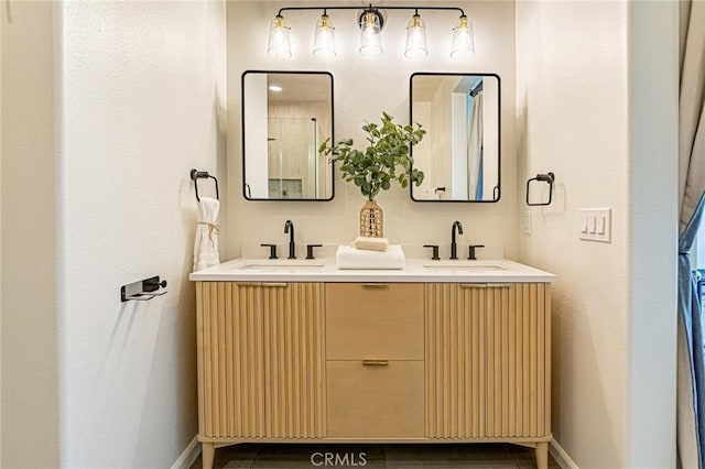 15405 Ashley Ct, Whittier, CA 90603 - bathroom with baseboards and double vanity