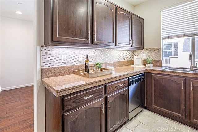 15405 Ashley Ct, Whittier, CA 90603 - kitchen with dishwasher, a sink, dark brown cabinets, tasteful backsplash, and baseboards