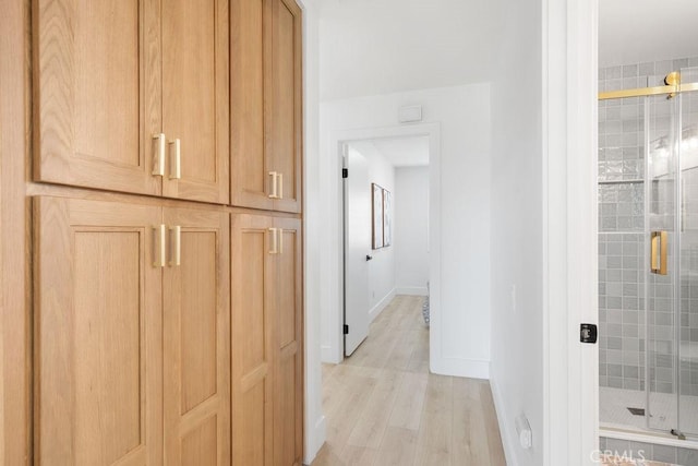 28116 Calle Casal, Mission Viejo, CA 92692 - hallway featuring baseboards and light wood-type flooring