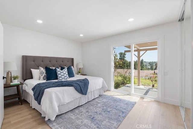 28116 Calle Casal, Mission Viejo, CA 92692 - bedroom with light wood-type flooring, access to exterior, and recessed lighting