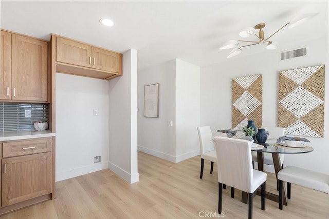 28116 Calle Casal, Mission Viejo, CA 92692 - dining area with light wood-style floors, a chandelier, baseboards, and recessed lighting
