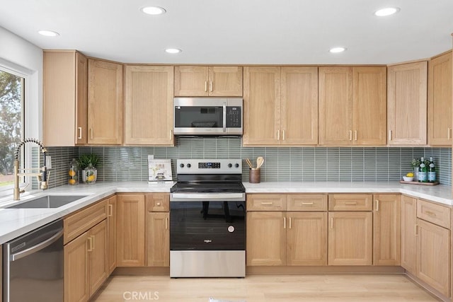 28116 Calle Casal, Mission Viejo, CA 92692 - kitchen with appliances with stainless steel finishes, a sink, light countertops, light brown cabinetry, and recessed lighting