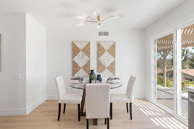 28116 Calle Casal, Mission Viejo, CA 92692 - dining room featuring healthy amount of natural light, light wood-style flooring, baseboards, and a chandelier