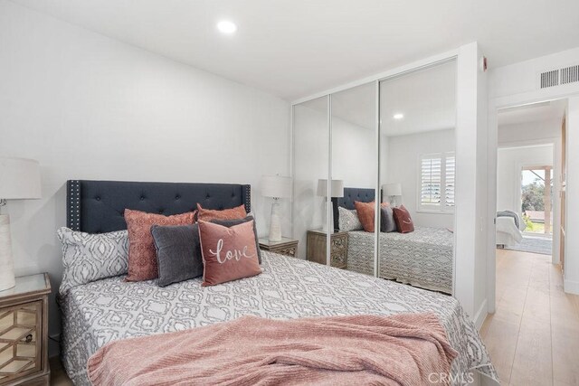 28116 Calle Casal, Mission Viejo, CA 92692 - bedroom with wood finished floors, a closet, recessed lighting, and lofted ceiling